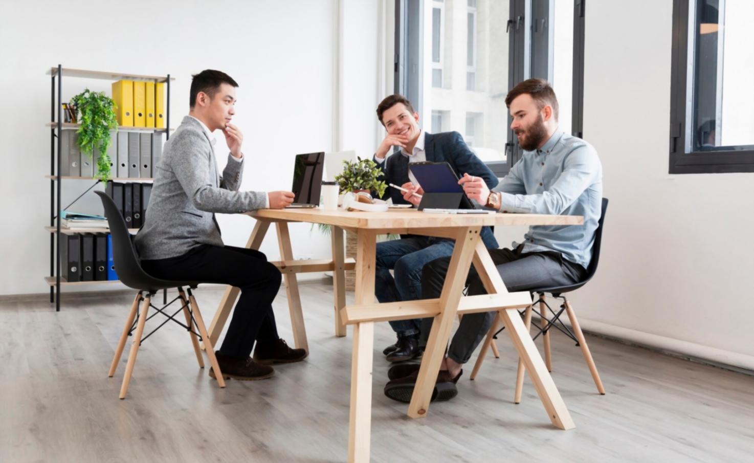 Financial data analysis workspace with market charts and research materials